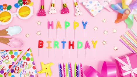 birthday party frame made of party accessories move around happy birthday candles. stop motion