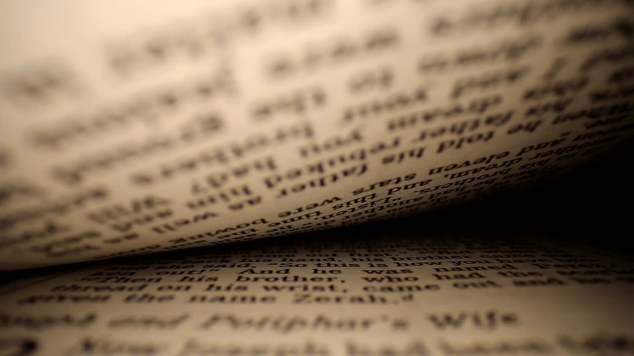 Pushing lens into book center of page