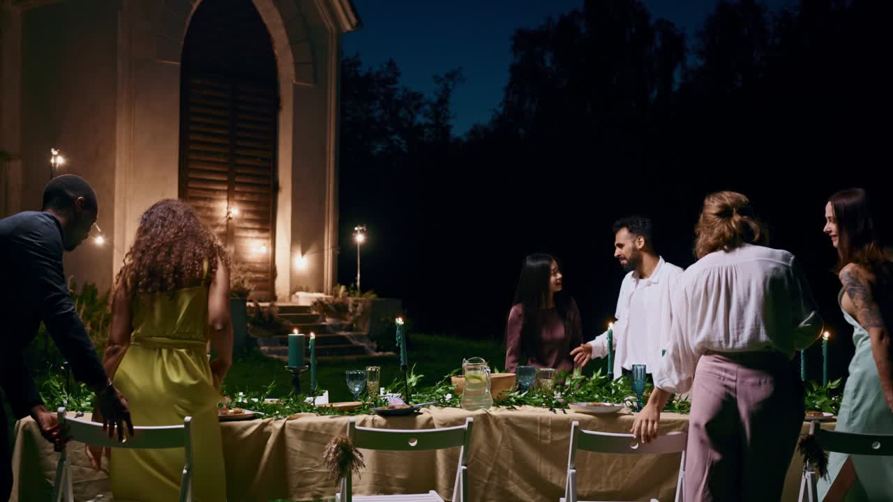 Group of friends having dinner party