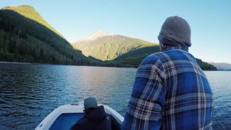 man riding a boat in the river 4k