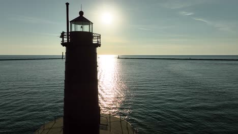 Three-lighthouses-framed-against-the-sunlight-splashed-water