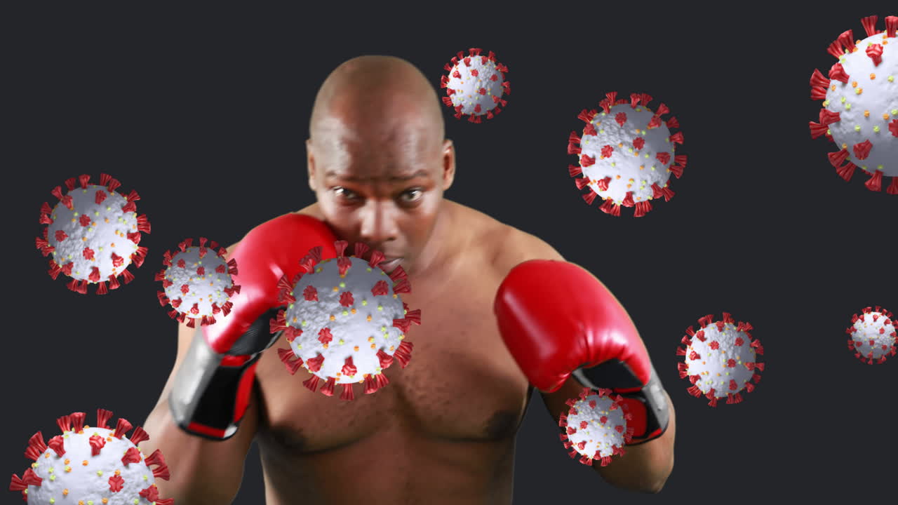 Animation of virus cells over african american man boxing