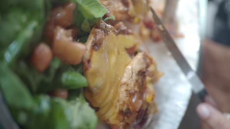 close-up of chicken and salad meal