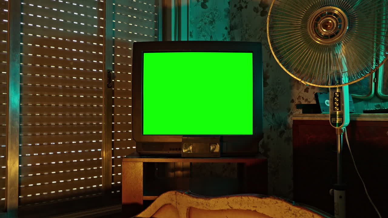Old CRT Television with Green Screen in a Retro Room