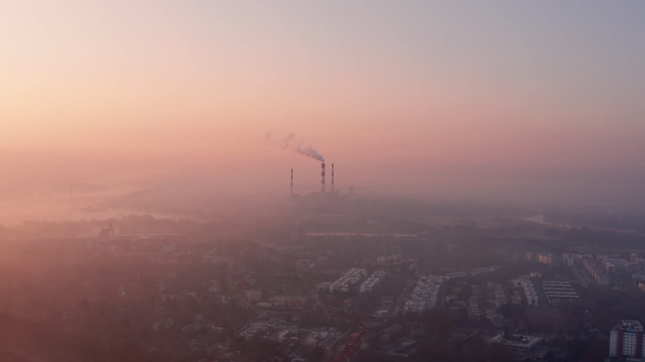 Orange foggy sunrise over Warsaw, Poland. Smog reduces visibility