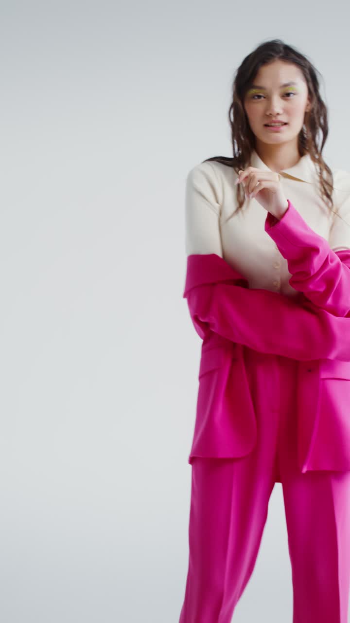 Stylish Woman in Pink Suit