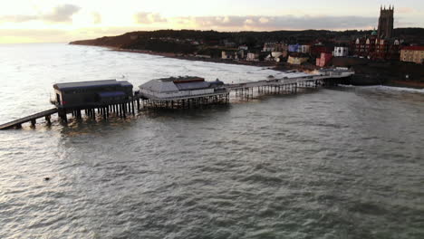 aerial footage of cromer pier and town shot from the sea