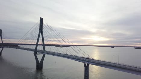 aerial flight around cable suspended bridge over the ocean