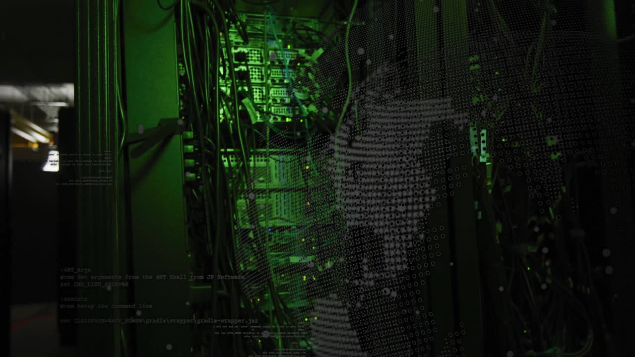 Binary code animation over green-lit server racks in data center