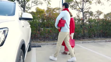 cheerful asian family with father, mother and daughter excited for holiday adventure in compact car are smiling and driving for travel on vacation