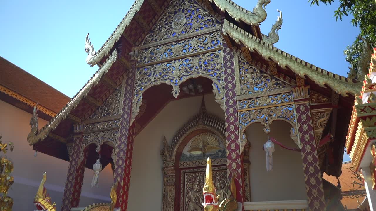 Intricate Carvings and Golden Details of a Thai Temple