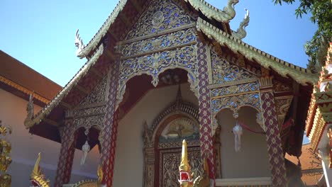 intricate carvings and golden details of a thai temple