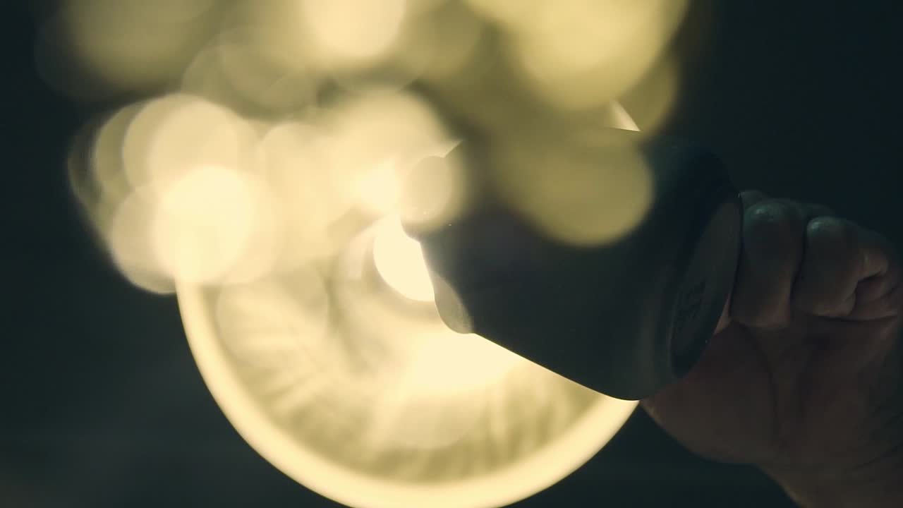 A chef serving delicious, healthy and natural honey on a dessert in an international gastronomic restaurant.
