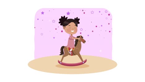 a happy little girl riding a rocking horse