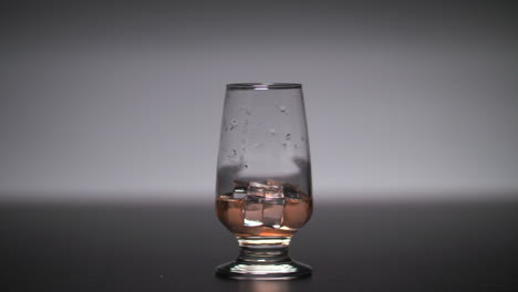 drink on the rocks slow motion light effect