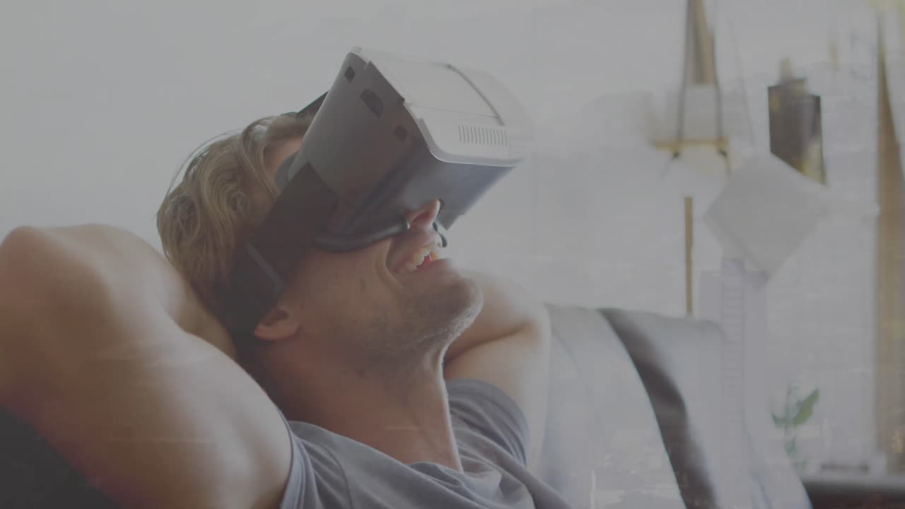 Animation of financial data processing over caucasian man using vr headset