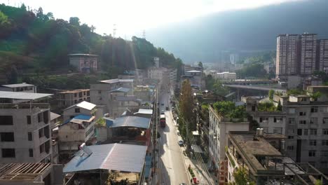 aerial above a sunny street in hefeng county