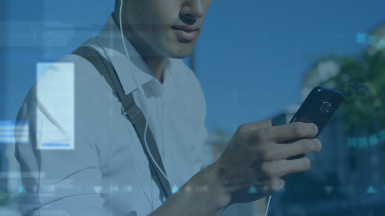 Animation of financial data processing and statistics over biracial man using smartphone