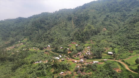 villages along dirt road in steep rift valley jungle mountains, congo