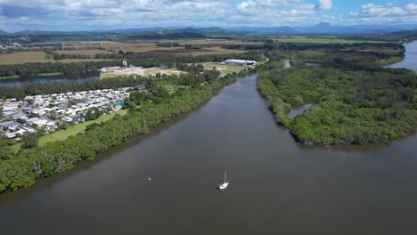 Sailboat-On-Tweed-River-Near-Green-Island-In-Chinderah,-New-South-Wales,-Australia