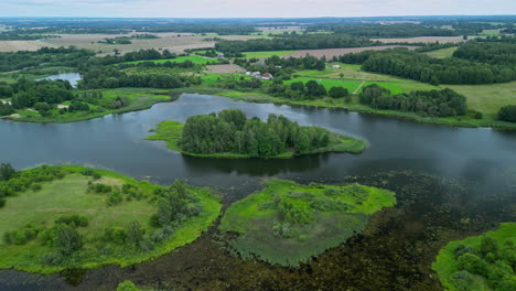 drone view over a green water landscape with several islands