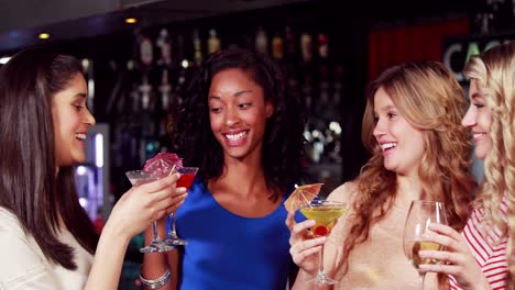 happy friends having a drink together