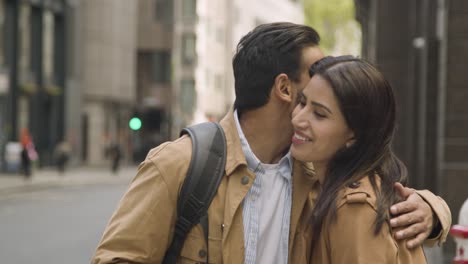 muslim couple on date meet on city street