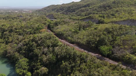 view of train line and the bog walk gorge from a drone