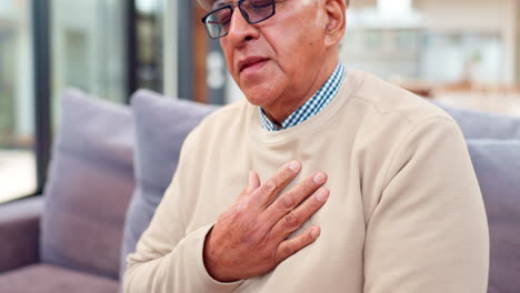 elderly man experiencing chest pain