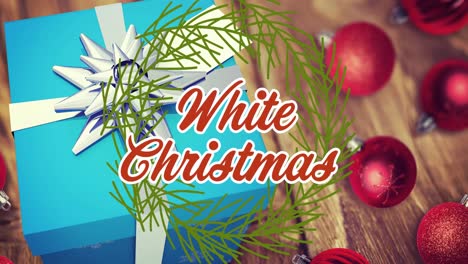 animation of white christmas text over presents and baubles in background