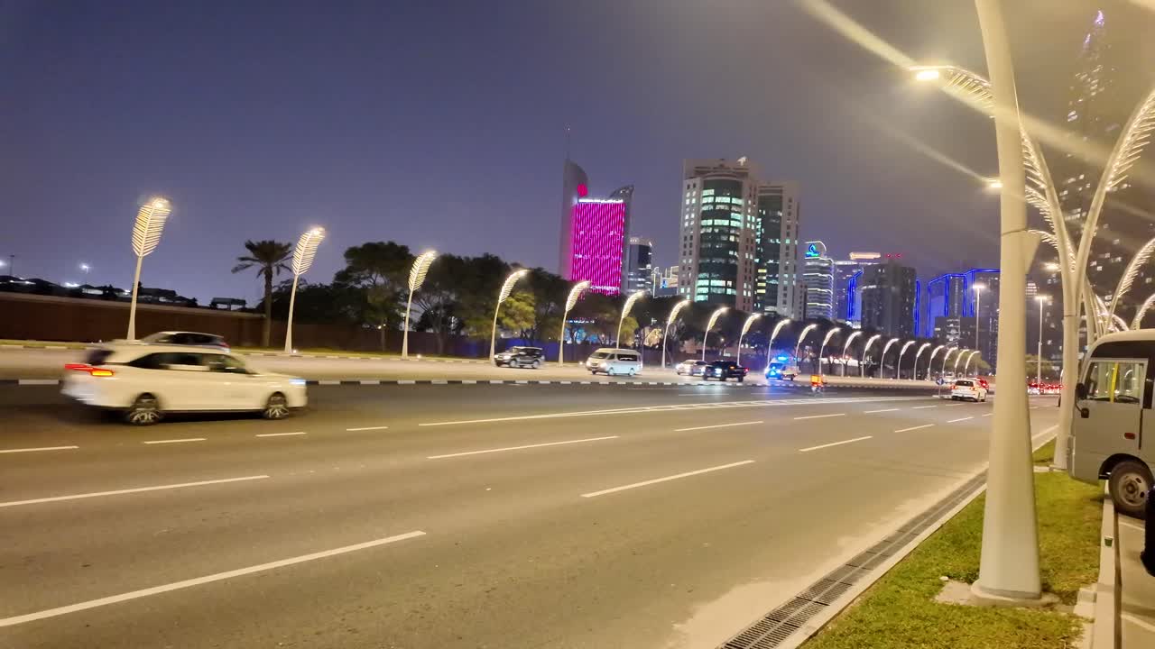 Night View of a City Street with Illuminated Decorative Lighting