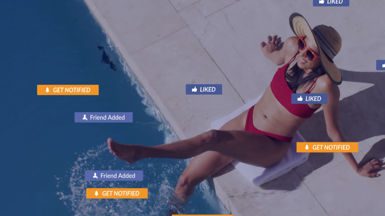 Relaxing by pool, woman in red bikini receiving animation of notifications