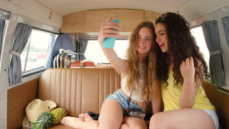 car, phone and friends taking selfie