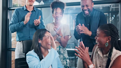 happy diverse team celebrating success