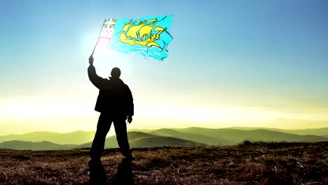 hombre de silueta exitoso ganador agitando la bandera de pierre y miquelón en la cima de la montaña, fondo de bucle de cinemagraph