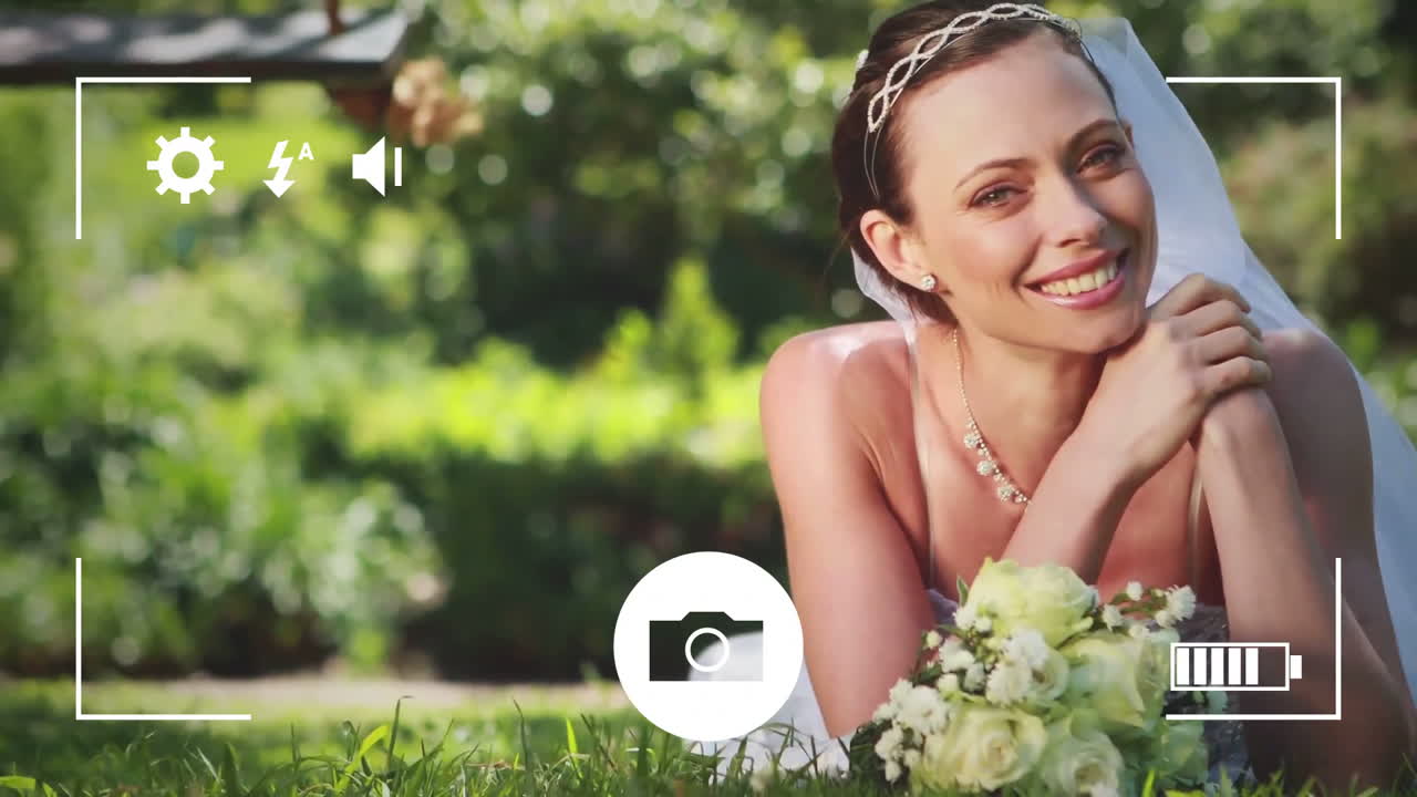 tomando fotos de una novia con una cámara digital