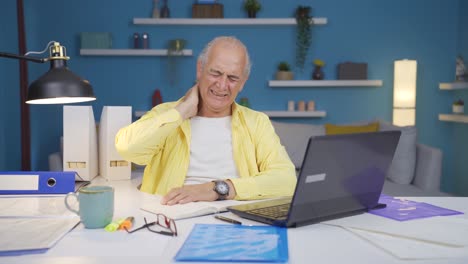 home office worker old man has neck pain.