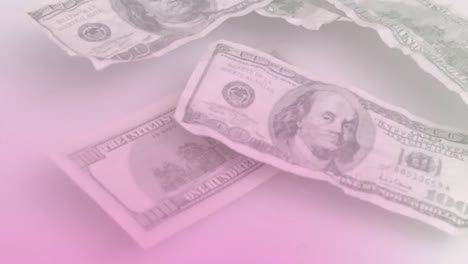 Animation-of-close-up-of-dollar-bills-flying-against-pink-gradient-background