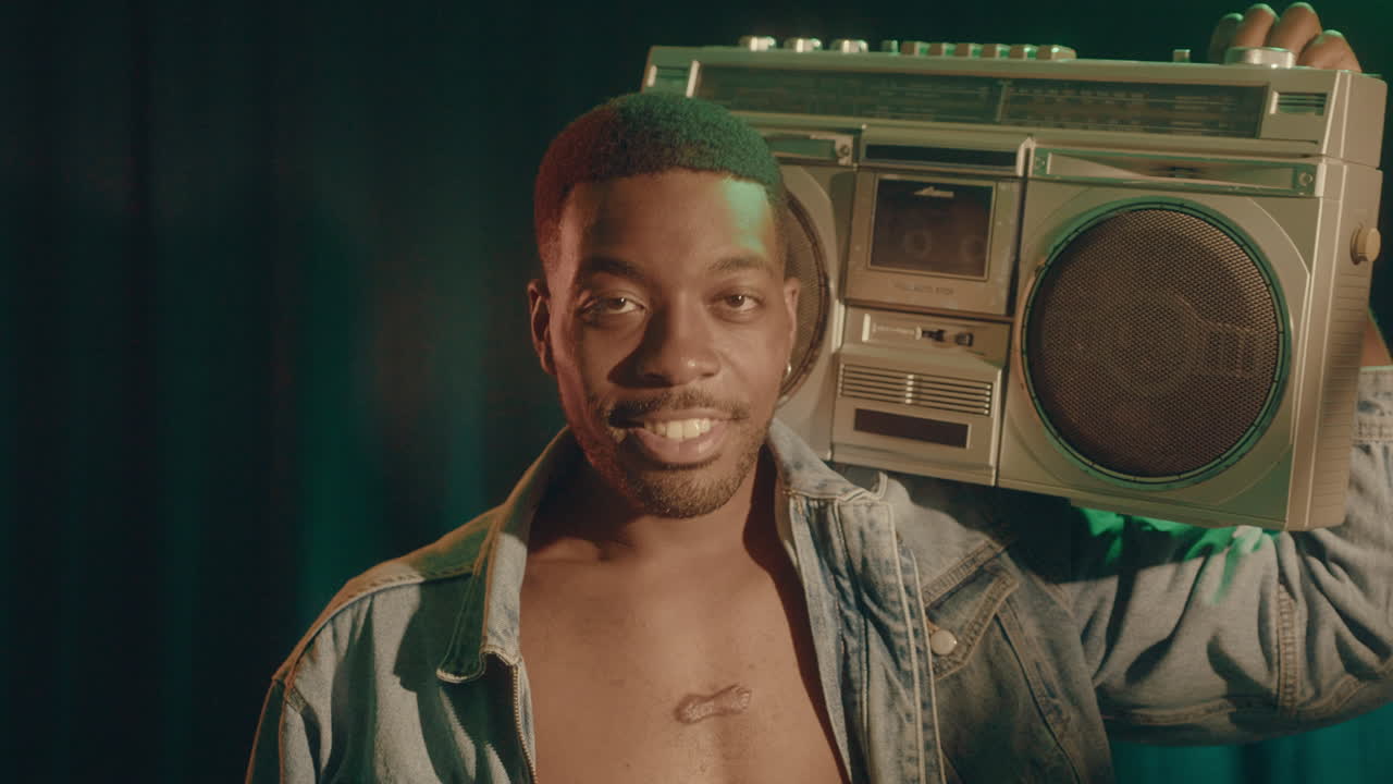 Black Man Vibing with Retro Ghetto Blaster on Shoulder