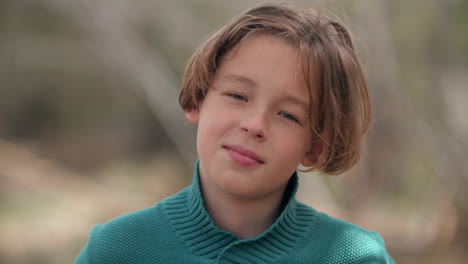 Portrait-of-a-teenager-boy-outdoors