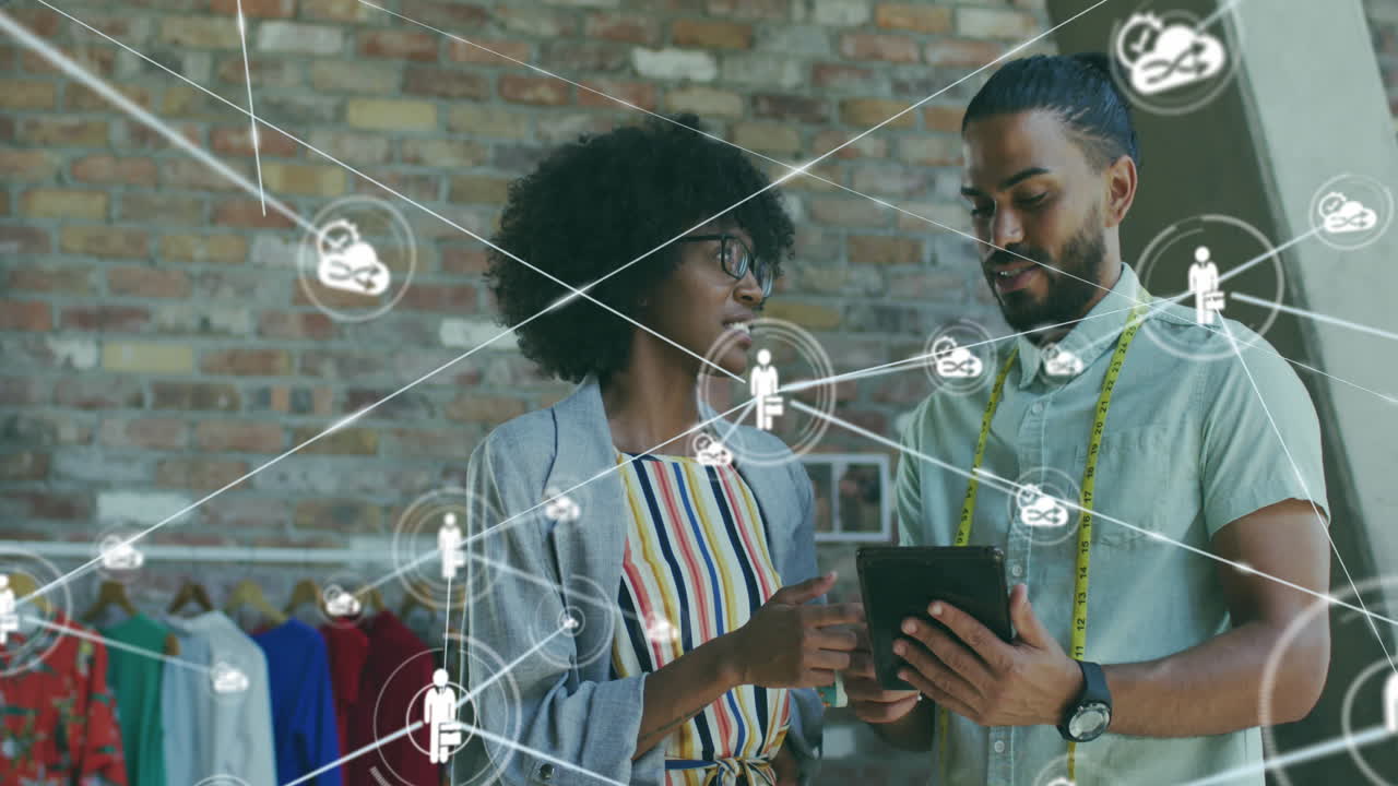 Animation of network of connections with icons over diverse business people in office