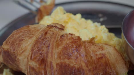 croissant with scrambled eggs