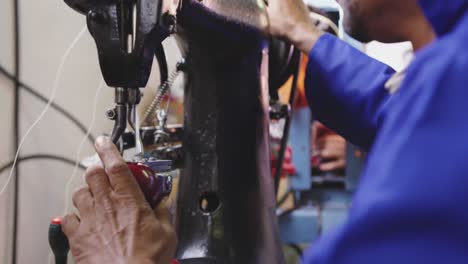 mixed race man working in factory