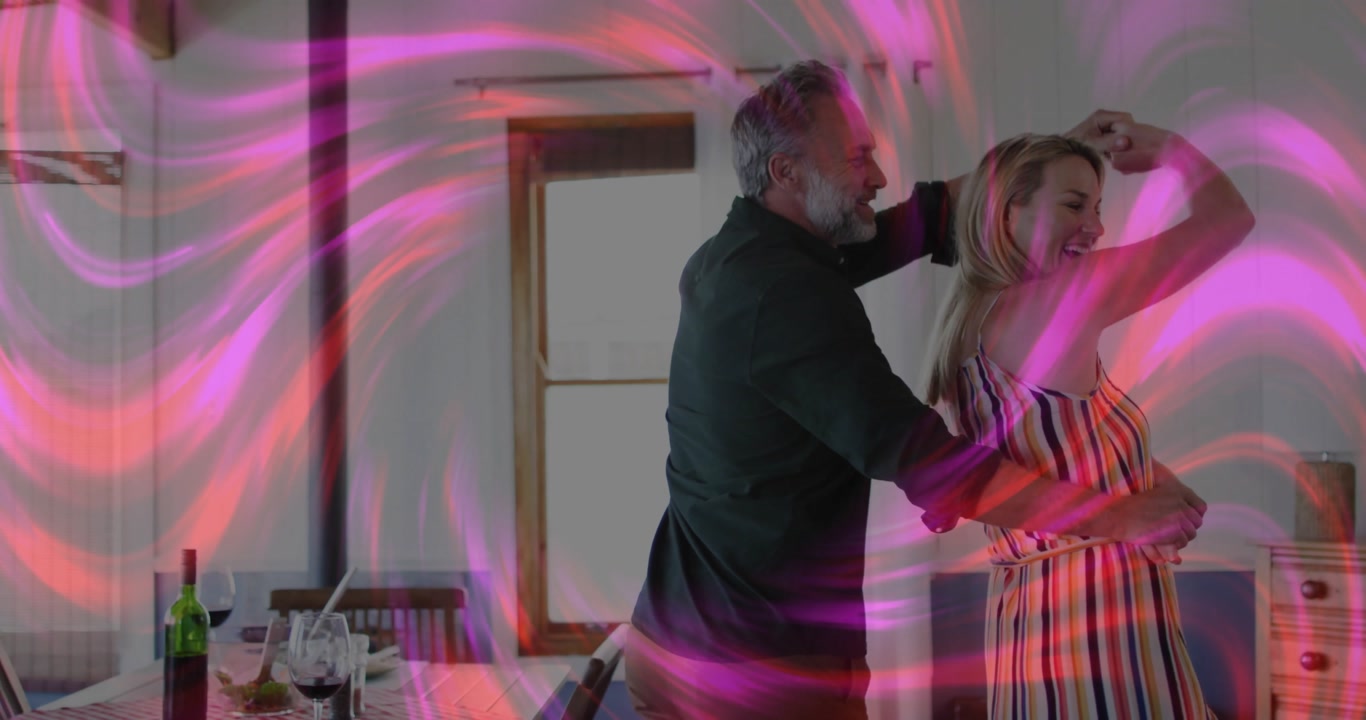 Man grabbing woman's hand initiating lifestyle dance for sharing joy with swirling light overlay