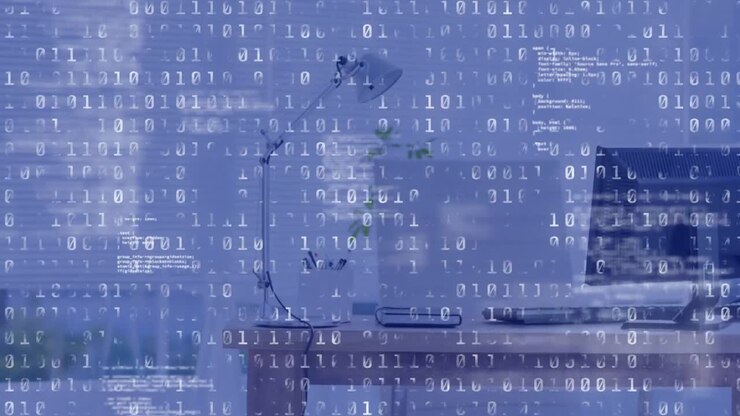 Binary coding data processing against empty office in background