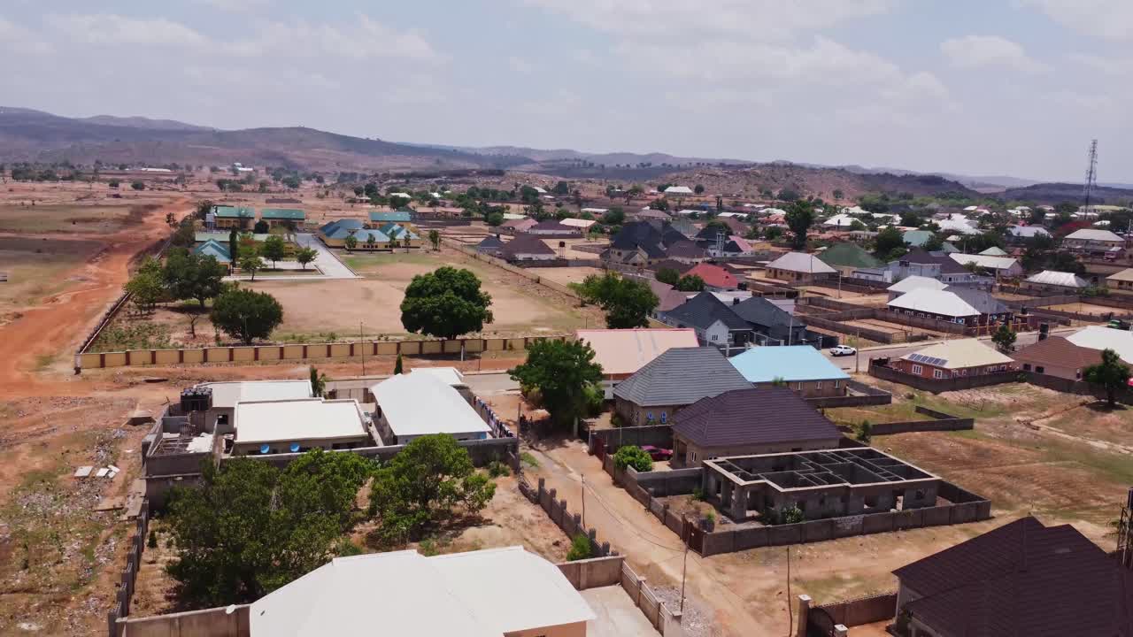 Jib up of a beautiful small town in rural Nigeria.