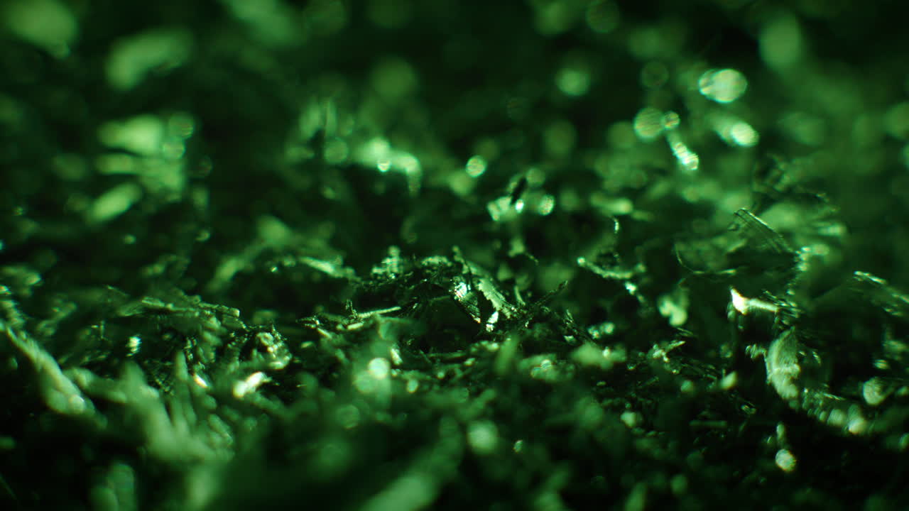 Emerald color metal fillings in macro