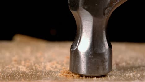 Hammer-smashing-biscuits-on-table