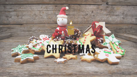 Animation-of-merry-christmas-text-over-christmas-cookies