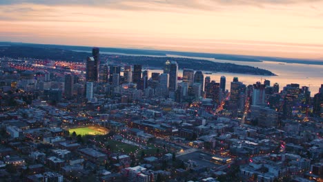 seattle capitol hill downtown skyline aerial puget sound pacific nw establishing shot evening sunset